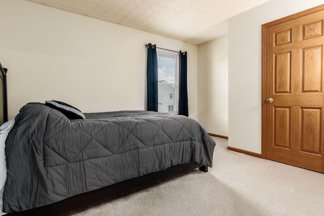 281 Inah Ave, Columbus, OH 43228 - bedroom featuring light colored carpet and a textured ceiling