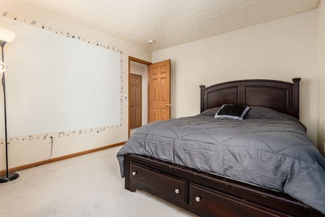 281 Inah Ave, Columbus, OH 43228 - carpeted bedroom featuring baseboards and a textured ceiling