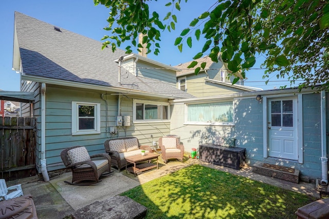 162 Watt St, Circleville, OH 43113 - rear view of property featuring a patio, a shingled roof, and an outdoor hangout area