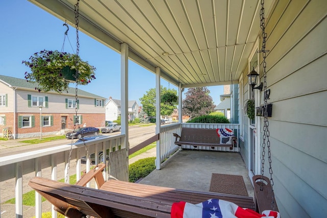 162 Watt St, Circleville, OH 43113 - wooden porch featuring a residential view