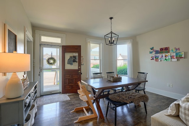 162 Watt St, Circleville, OH 43113 - dining area featuring a chandelier and dark wood-style floors