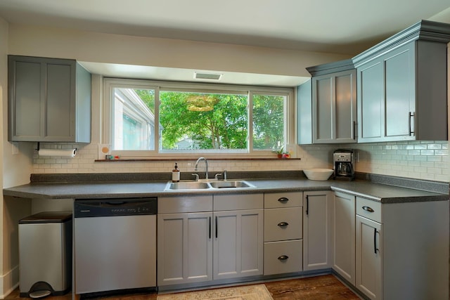 162 Watt St, Circleville, OH 43113 - kitchen featuring dishwasher, dark countertops, tasteful backsplash, and dark wood-style flooring