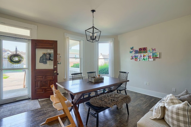 162 Watt St, Circleville, OH 43113 - dining room featuring a chandelier and dark wood-style flooring