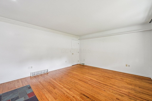 902 Brentford Dr, Columbus, OH 43220 - empty room with wood finished floors and baseboards