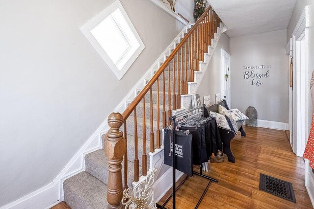 100 E Ohio Ave, Mount Vernon, OH 43050 - stairs with wood finished floors and a high ceiling