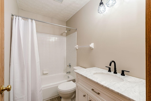7345 Oakmeadows Dr, Columbus, OH 43085 - full bathroom with a textured ceiling, shower / bath combination with curtain, and vanity