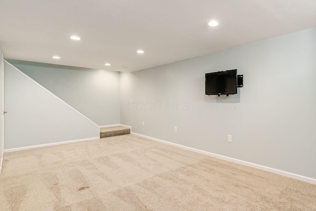 7345 Oakmeadows Dr, Columbus, OH 43085 - below grade area featuring recessed lighting, carpet, and stairway