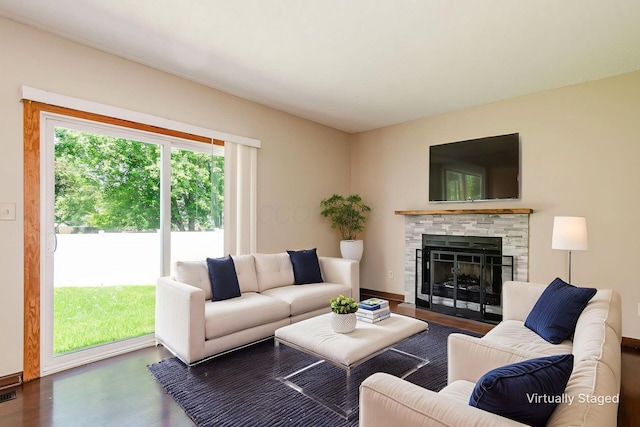 7345 Oakmeadows Dr, Columbus, OH 43085 - living area featuring wood finished floors and a fireplace