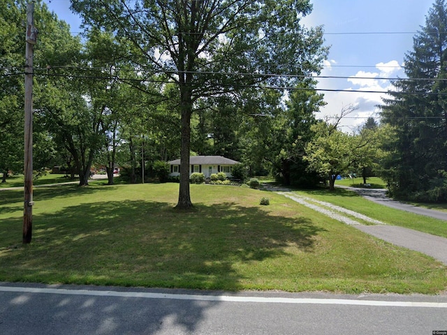 12110 Fancher Rd, Westerville, OH 43082 - view of front facade featuring a front lawn and driveway
