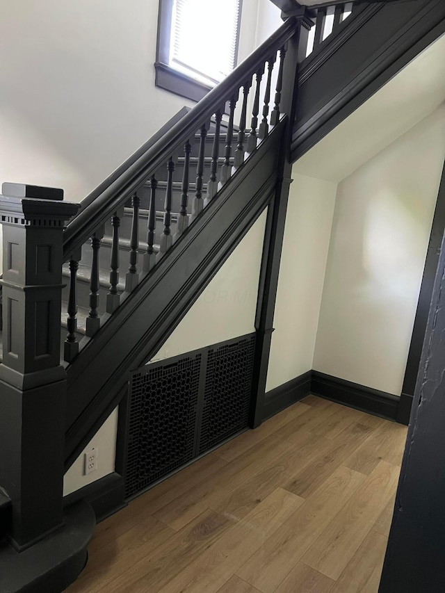 51 E N St, Newark, OH 43055 - staircase featuring wood finished floors and baseboards