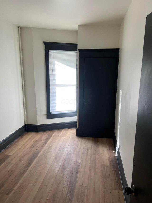 51 E N St, Newark, OH 43055 - empty room with wood finished floors