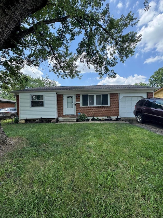1703 Quigley Rd, Columbus, OH 43227 - single story home with an attached garage, brick siding, entry steps, and a front lawn
