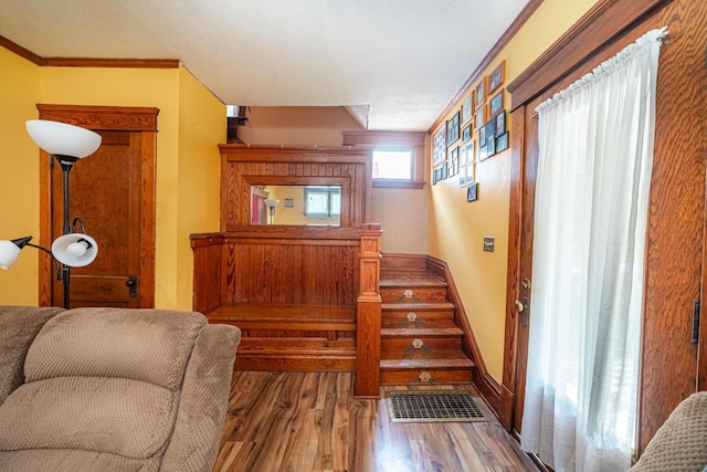559 Pearl St, Marion, OH 43302 - stairway with wood finished floors and crown molding