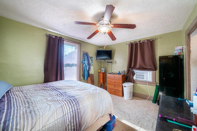 559 Pearl St, Marion, OH 43302 - bedroom with cooling unit, carpet, a textured ceiling, and ceiling fan