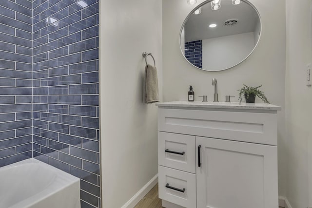 1080 Coonpath Rd NW, Lancaster, OH 43130 - full bathroom with vanity, wood finished floors, and  shower combination