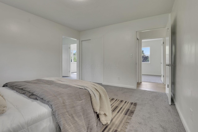 1080 Coonpath Rd NW, Lancaster, OH 43130 - carpeted bedroom with baseboards and a closet