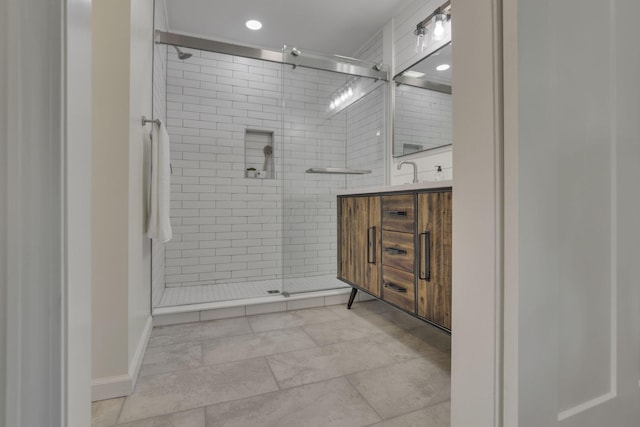 1080 Coonpath Rd NW, Lancaster, OH 43130 - bathroom with a shower stall, double vanity, and recessed lighting