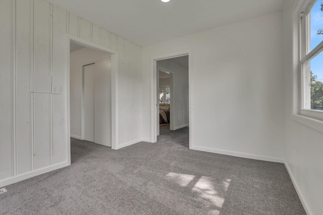 1080 Coonpath Rd NW, Lancaster, OH 43130 - carpeted empty room featuring healthy amount of natural light