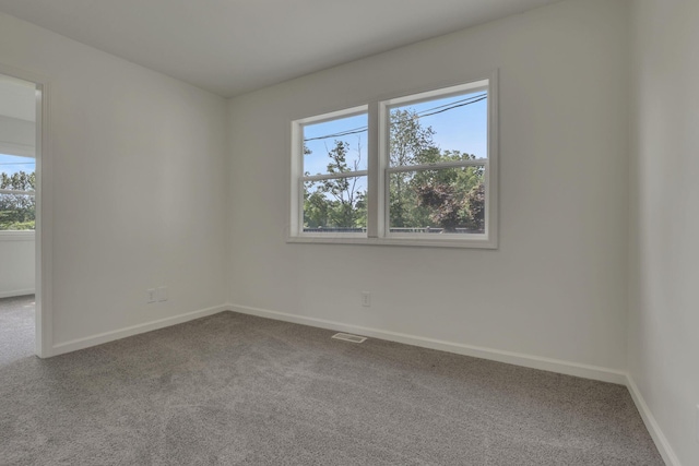 1080 Coonpath Rd NW, Lancaster, OH 43130 - carpeted empty room featuring baseboards
