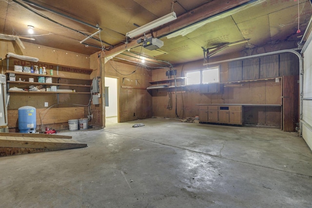 1080 Coonpath Rd NW, Lancaster, OH 43130 - garage with a garage door opener and water heater