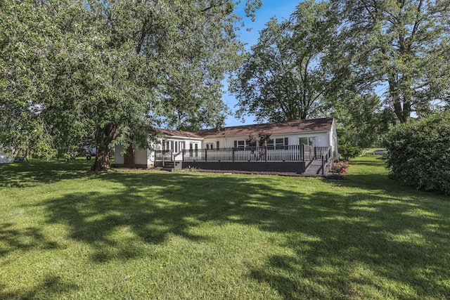 1080 Coonpath Rd NW, Lancaster, OH 43130 - back of house with a yard and a deck