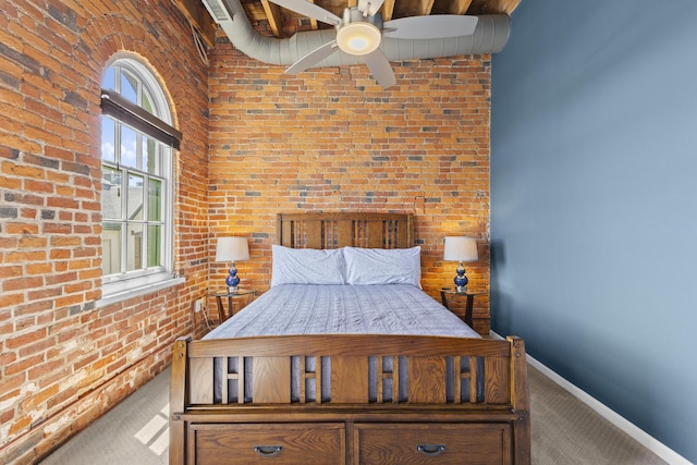 51 W Blenkner St Unit 306, Columbus, OH 43215 - bedroom with carpet floors, a towering ceiling, brick wall, and ceiling fan