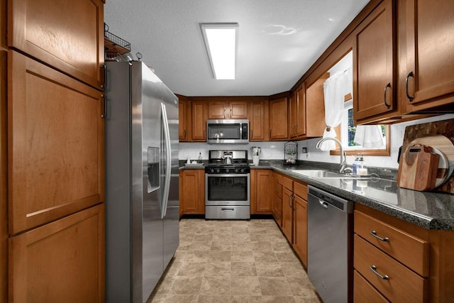 4619 Spring Hill Rd, Heath, OH 43056 - kitchen with stainless steel appliances and brown cabinetry