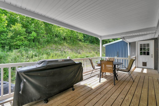 4619 Spring Hill Rd, Heath, OH 43056 - wooden terrace featuring outdoor dining area and a grill