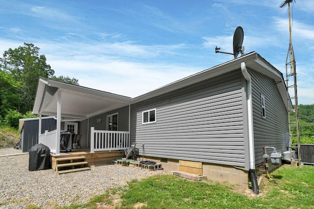 4619 Spring Hill Rd, Heath, OH 43056 - rear view of house with crawl space and a wooden deck