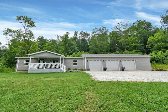 4619 Spring Hill Rd, Heath, OH 43056 - view of front of home with covered porch, a front yard, and a garage