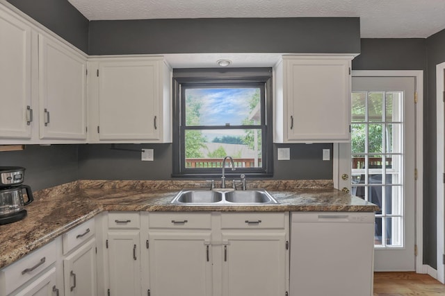 748 Forward Pass Rd SW, Pataskala, OH 43062 - kitchen with white cabinetry, wood finished floors, and a textured ceiling