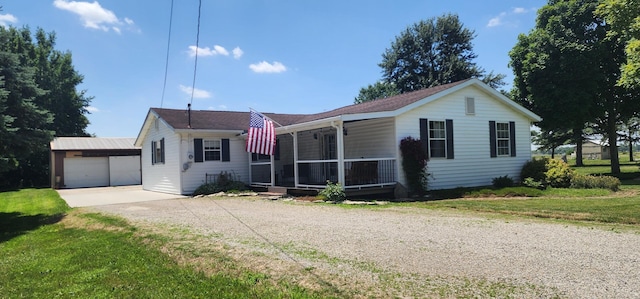 11195 Hoskins Rd, Richwood, OH 43344 - view of front of property featuring an outbuilding, driveway, and a front yard