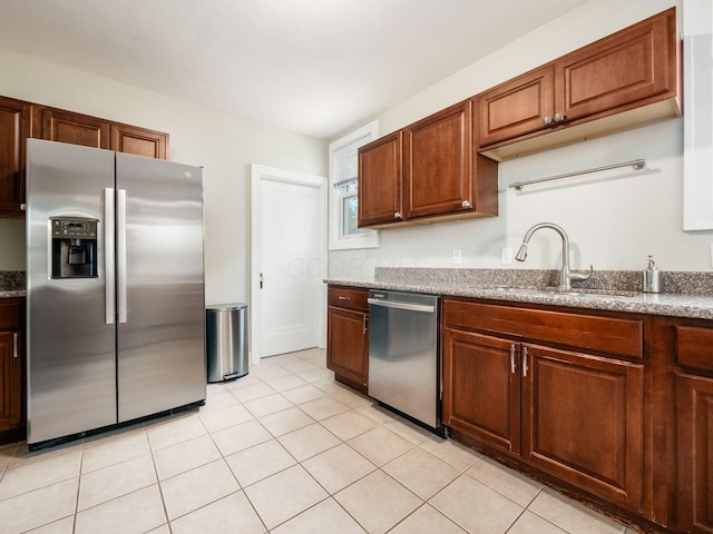 211 E Jenkins Ave, Columbus, OH 43207 - kitchen featuring stainless steel appliances and light tile patterned floors