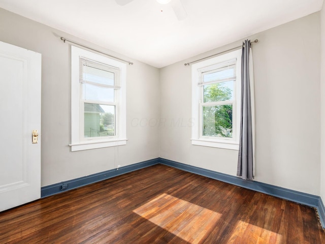 211 E Jenkins Ave, Columbus, OH 43207 - unfurnished room with dark wood-type flooring and a ceiling fan