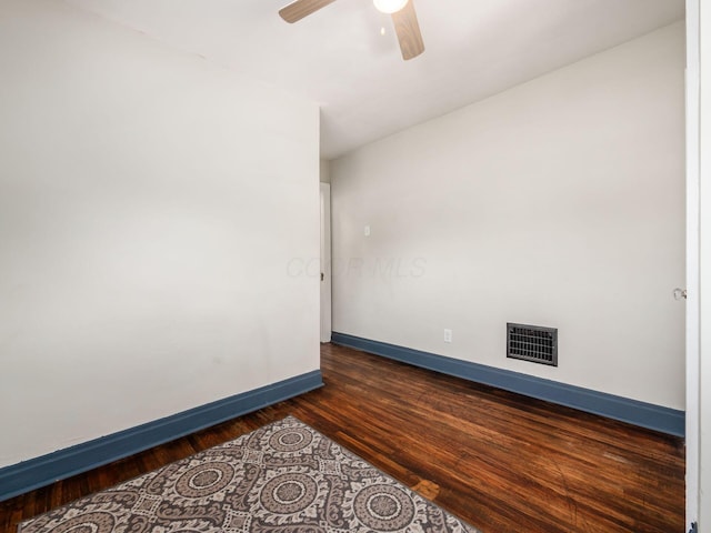 211 E Jenkins Ave, Columbus, OH 43207 - unfurnished room featuring dark wood-type flooring and a ceiling fan