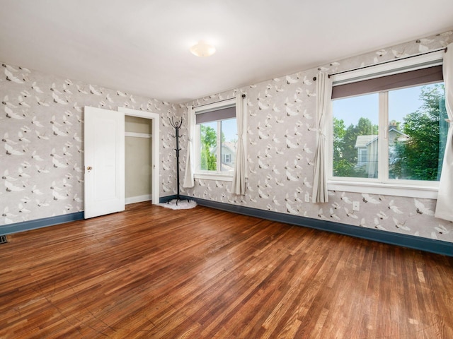 211 E Jenkins Ave, Columbus, OH 43207 - unfurnished room with baseboards and wood finished floors