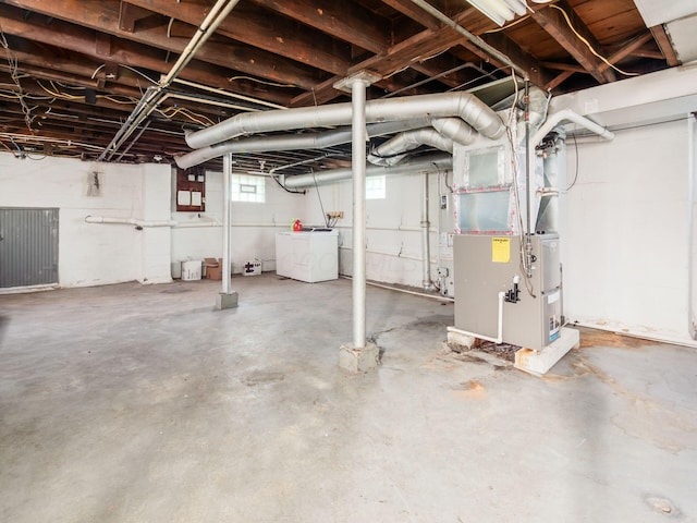 211 E Jenkins Ave, Columbus, OH 43207 - below grade area with washer / dryer and heating unit