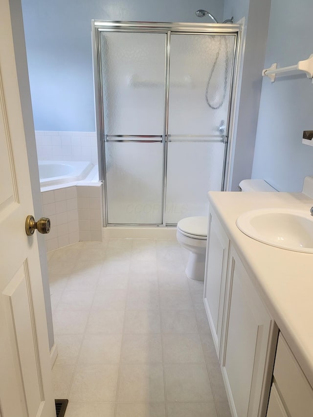 417 Hannifin Dr, Blacklick, OH 43004 - bathroom with a stall shower, a bath, vanity, and tile patterned flooring