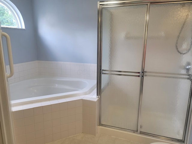 417 Hannifin Dr, Blacklick, OH 43004 - bathroom with a garden tub, a shower stall, and tile patterned flooring