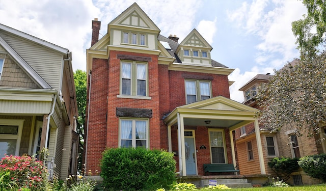 1447 Fair Ave, Columbus, OH 43205 - view of front facade featuring brick siding and a chimney
