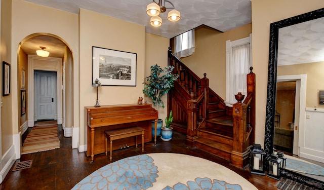 1447 Fair Ave, Columbus, OH 43205 - entryway featuring wood finished floors, stairs, and arched walkways