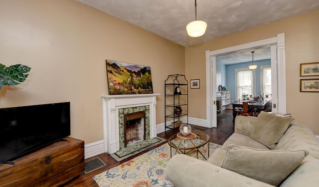 1447 Fair Ave, Columbus, OH 43205 - living area with wood finished floors and a fireplace