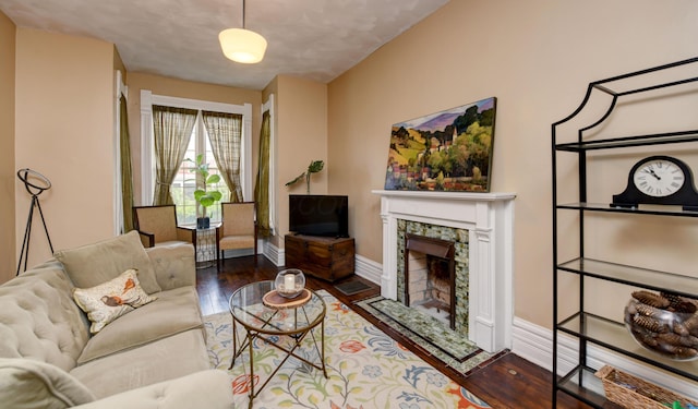 1447 Fair Ave, Columbus, OH 43205 - living area with a fireplace and wood finished floors