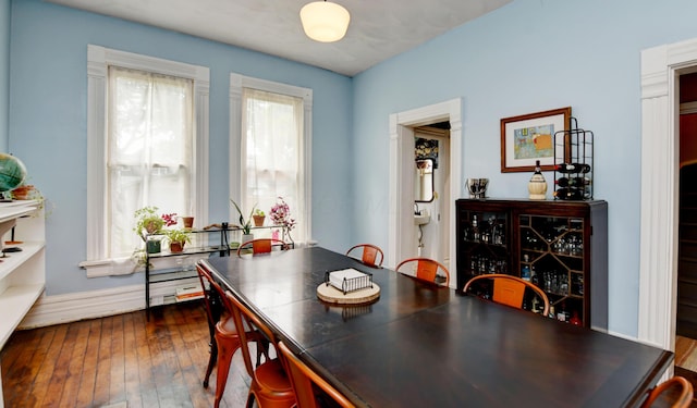 1447 Fair Ave, Columbus, OH 43205 - dining area featuring dark wood finished floors and baseboards