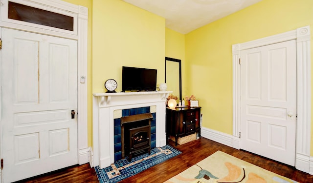 1447 Fair Ave, Columbus, OH 43205 - living area with dark wood finished floors and a wood stove