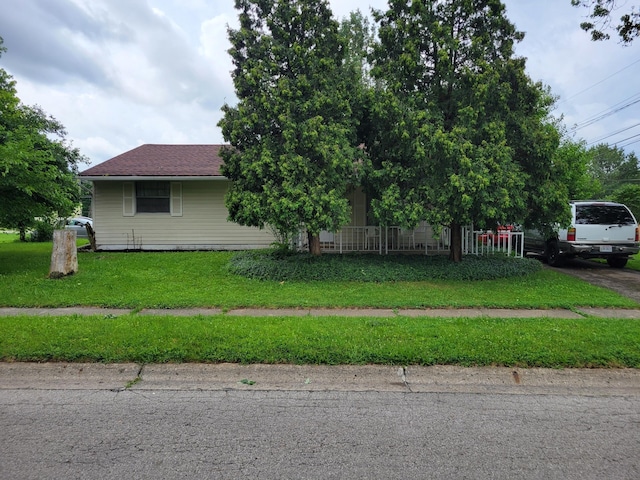 327 Ziegler Ave, Columbus, OH 43207 - view of property exterior with a lawn and a shingled roof