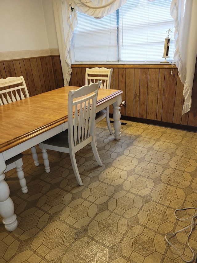327 Ziegler Ave, Columbus, OH 43207 - dining area featuring wood walls and wainscoting