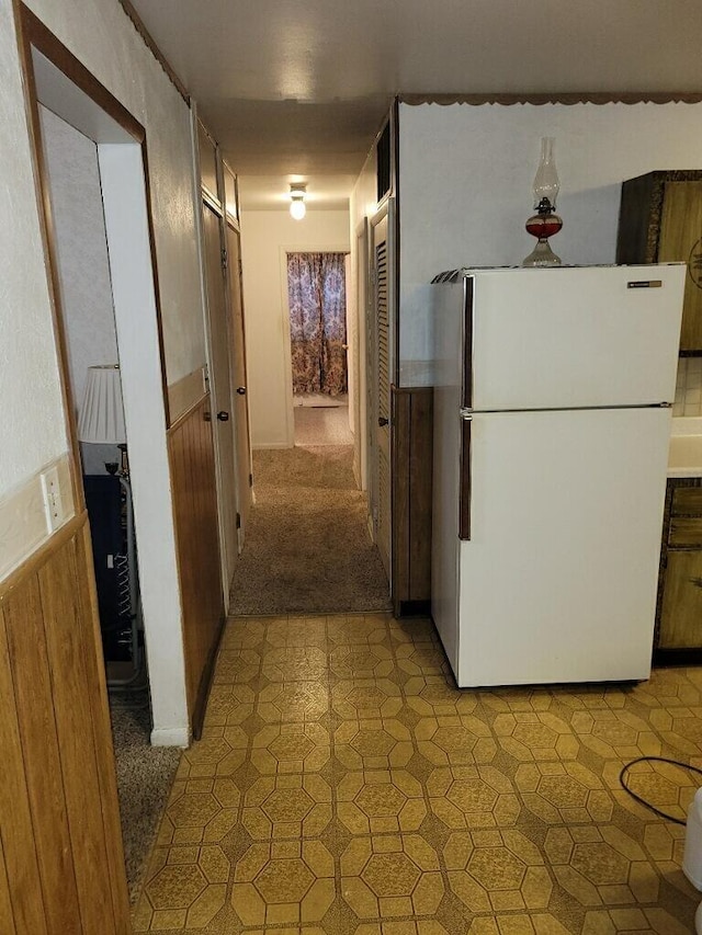 327 Ziegler Ave, Columbus, OH 43207 - kitchen with freestanding refrigerator and light floors