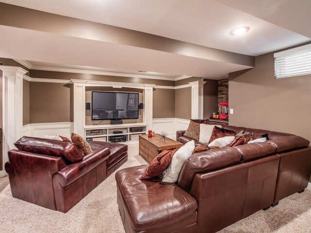 7635 Overland Trl, Delaware, OH 43015 - living room with decorative columns, carpet flooring, ornamental molding, a decorative wall, and a wainscoted wall