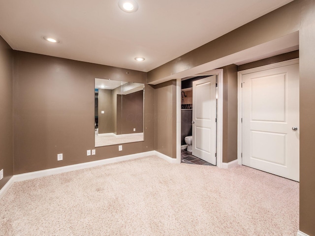 7635 Overland Trl, Delaware, OH 43015 - unfurnished bedroom with carpet floors, ensuite bathroom, and recessed lighting